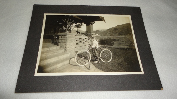 Mounted Black and White Photo of a Boy and his Bicycle in eastern Washington